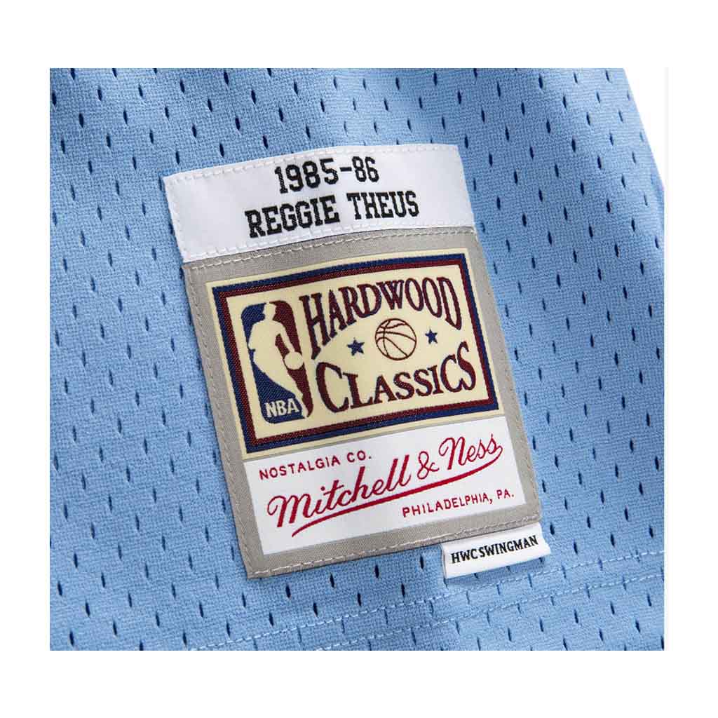 Men's Mitchell & Ness Reggie Theus Light Blue Sacramento Kings 1985-86  Hardwood Classics Swingman Jersey